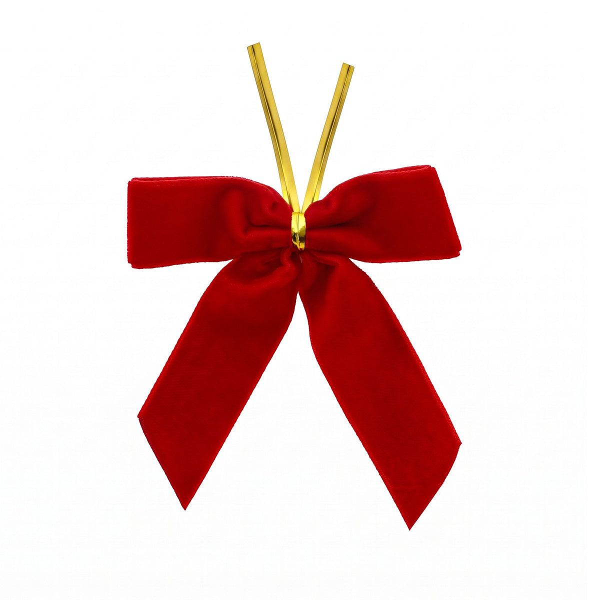 Red velvet Christmas bows on a decorated tree