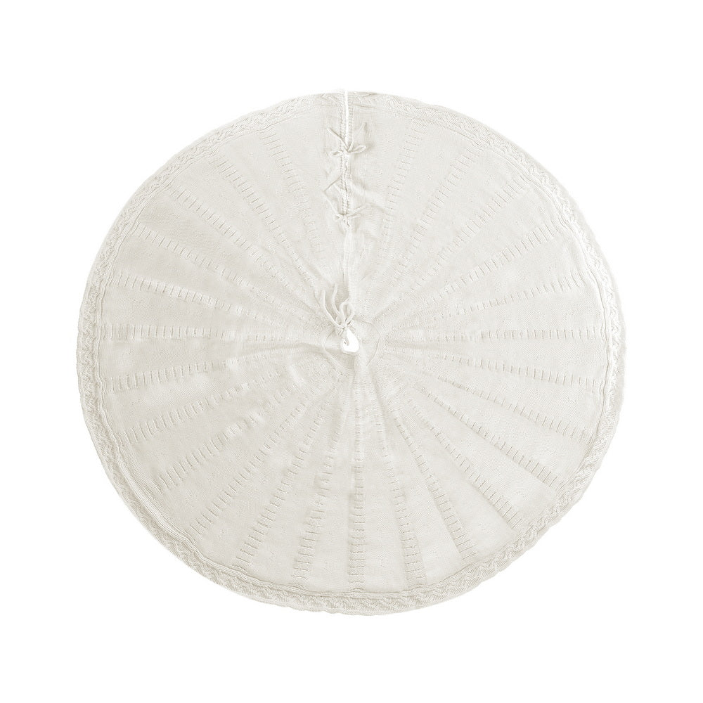 Beige knitted Christmas tree skirt under a decorated tree – 90cm